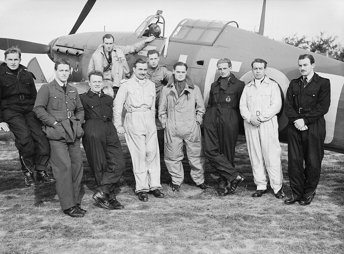 Squadron_Leader_Douglas_Bader_with_pilots_of_No._242_Squadron_in_front_of_his_Hawker_Hurricane_at_Duxford,_September_1940._CH141