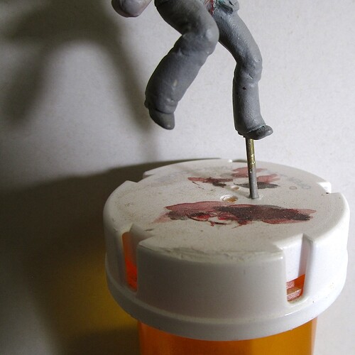 Figure_pinned_to_holder