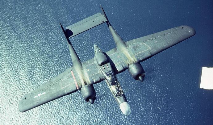 A 013 northrop-p-61-black-widow-in-flight-with-two-50-cals-in-the-v0-dh0o9bdba7ea1