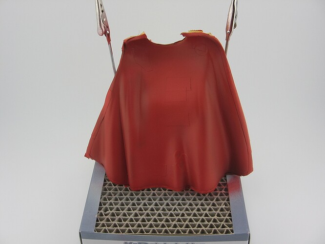 Cape, Red Applied