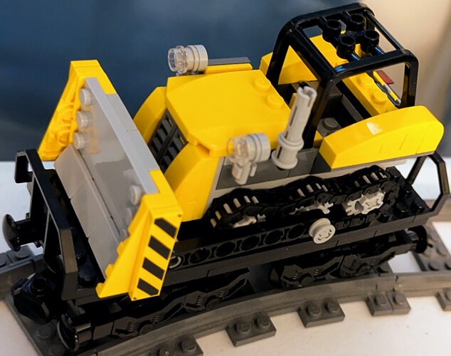 small flatcar with bulldozer load - real world MOC
