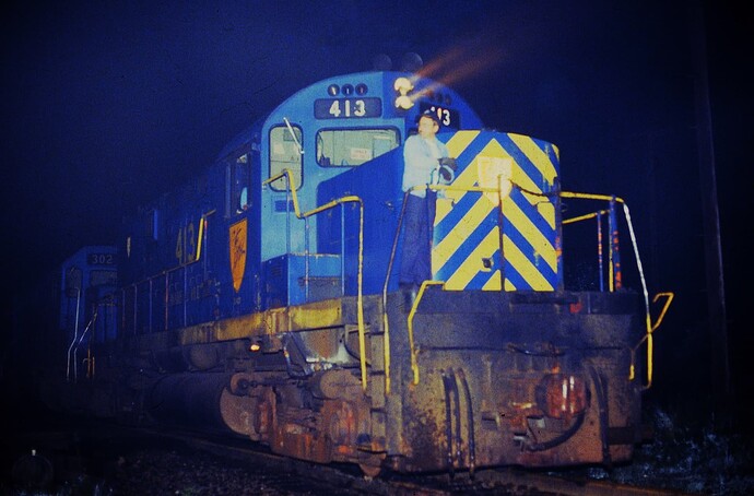 D&H Alco C-420 #413 was heading north to Belden Tunnel as the brakeman guided the train in the night in August 1984.