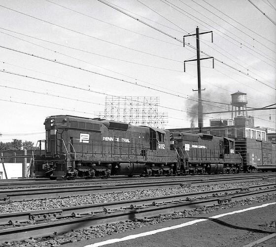 PC. SD-9 #6912 & #6913 with west freight at No. Rahway, NJ. Sept 17, 1972