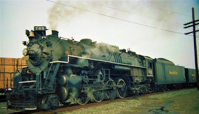 Photo 83. NKP #765 on fan trip in August 1988. Leaving Bound Brook, NJ.