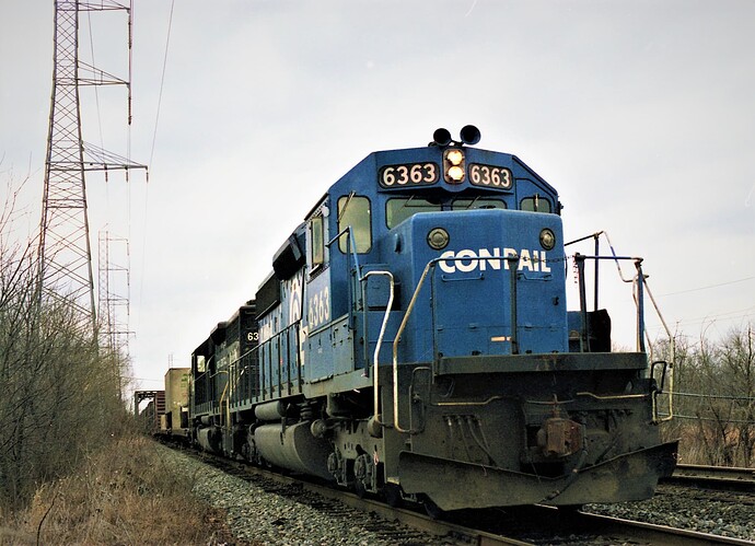 Photo 79. SD-40 # 6363 & 6357 on eastbound feight on ex-Lehigh Valley tracks near Bound Brook, NJ. early April 1980.