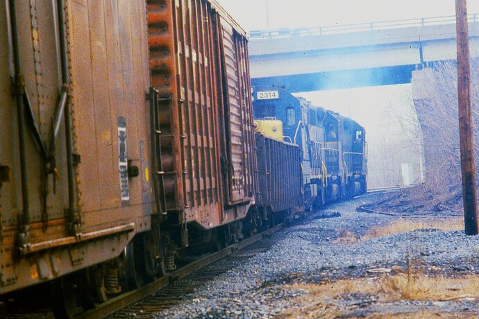 D&H freight goes under Rt 80 at White Haven heading north to Scranton, PA. Mar 1980