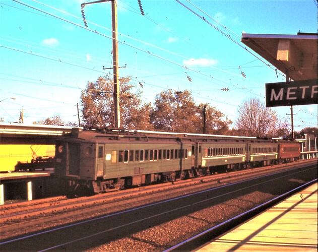 PC. Ex PRR MP54 trainset at Metropark, Iselin, NJ. Oct 18, 1971