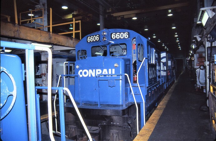 Conrail. Enola Diesel Terminal and GE C30-7  #6606 in for servicing. May 1986