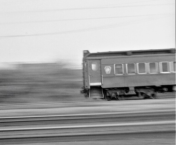 Penn Central. ex PRR MP-54 westbound at speed at North Rahway, NJ. Sept 17, 1972
