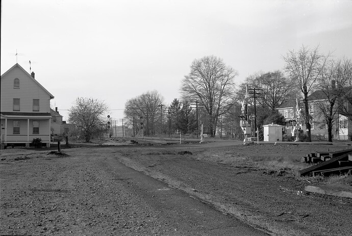 CNJ. Raritan, NJ. Looking west at 1st Ave. Tracks are ripped up in prep for new bridge. April 1973