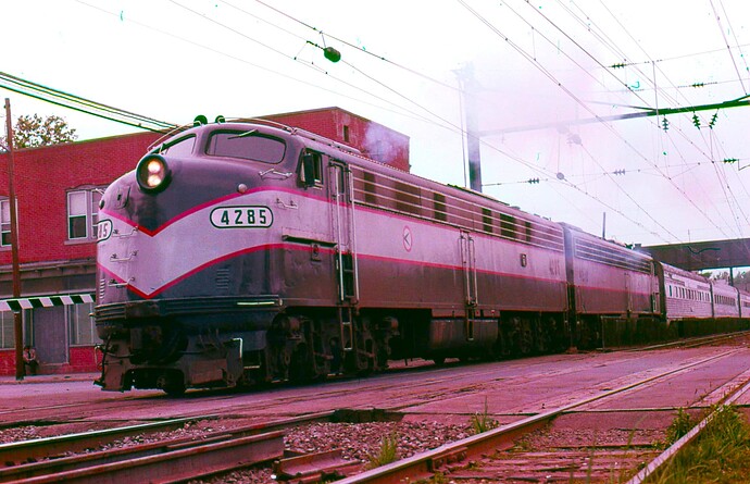 NJT. E-8 #4285 & other E-8. West (South) at South Amboy, NJ. Heading to Bay Head after engine change. Sept 1980