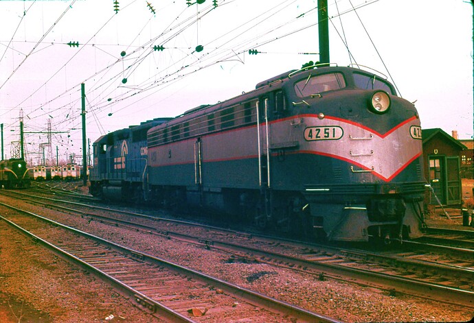 E-8 #4251 & Conrail GP-40 #3251. South Amboy, NJ. Sept 1979.
