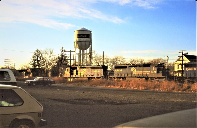 Photo 61. SD45 #6103 SD40-2 #6472 & other unit. West at Manville, NJ. Dec 1981