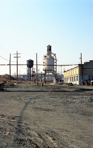 NJT. South Amboy, NJ engine house & remains from steam engine days. April 1983