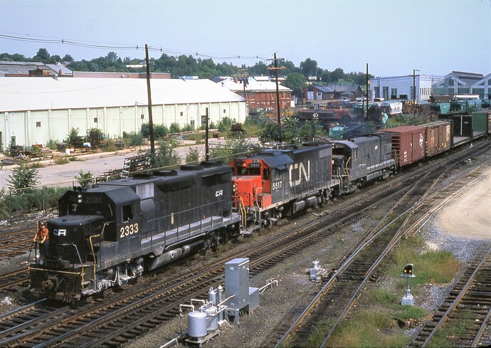CR. GP35 #2333, CN GR-20b #5517, U23B #2742. Altoona, PA. C.P. Works. 8-16-77