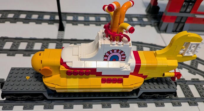 Yellow Submarine on railroad heavy duty flatcar