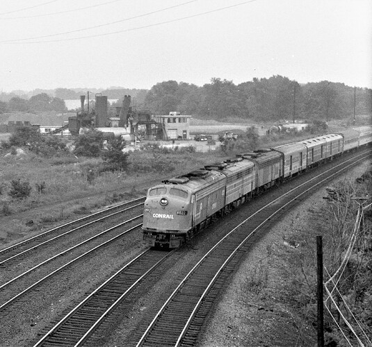 CR. E-8 #4022 with westbound Broadway Limited (tr 41) leaving Harrisburg, PA. August 18, 1977
