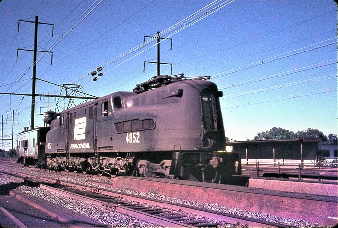 PC. GG-1 #4852 on a caboose hop at No. Rahway, NJ. 9-10-72