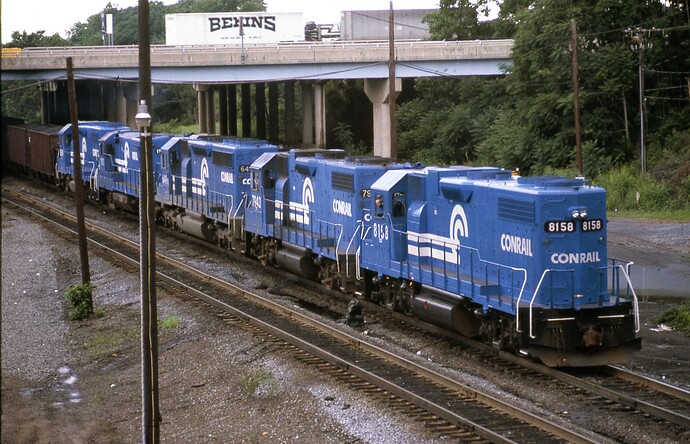 Conrail. Enola, PA. Units pushing coal train into yards. July 1984