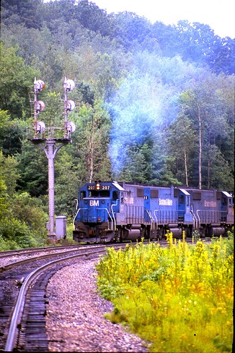 D&H. B&M GP38-2 #207 heading south out of the Belden Tunnel, Belden, NY. August 1984