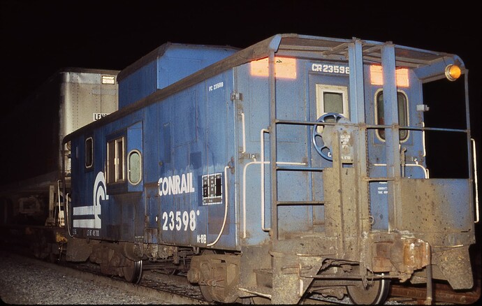 Photo 73.  N8B Caboose #23598 on westbound TV 61. Bound Brook, NJ. Jan 1986