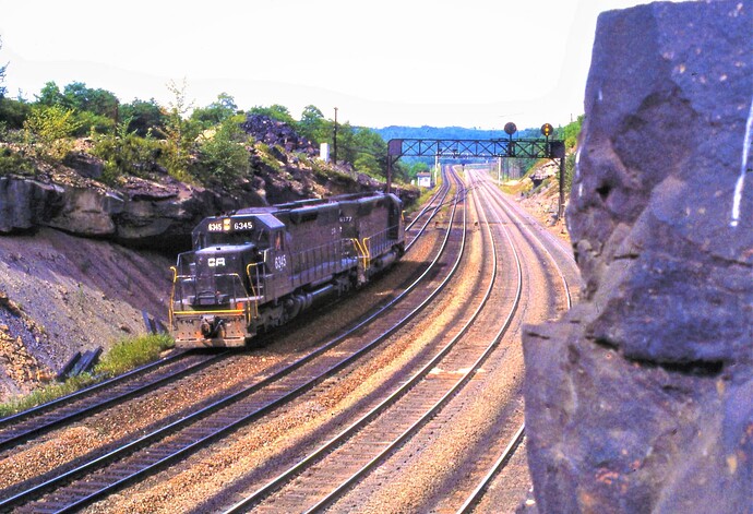 CR. SD-40 #6345 & SD-45 #6177 drifting eb at Benny Curve, 8-31-77