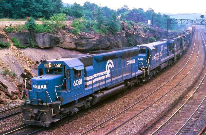 CR, SD45 #6081, C30-7A #6595 & 4 other units. East at Bennington Curve, July 1978