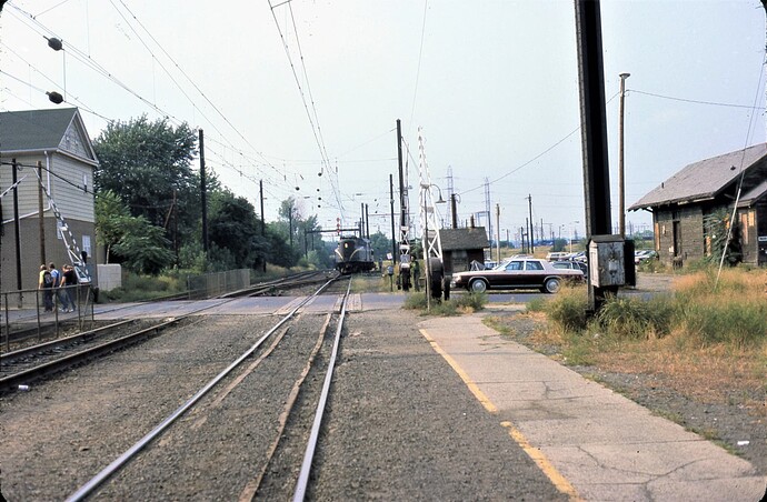 NJT. South Amboy, NJ. looking north. GG-1 going to layover yard. Augusta St. September 1982