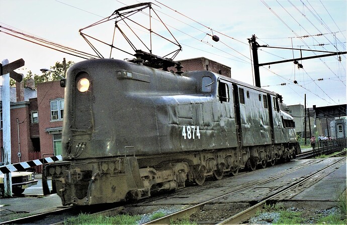 NJT GG-1 # 4874 during engine swap at South Amboy, NJ. Train came from NYC. 1980