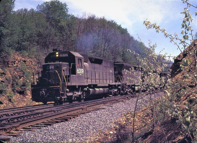 CR. SD35 #6309 & other units are westbound freight  at Bennington Interlocking. May 5, 1977