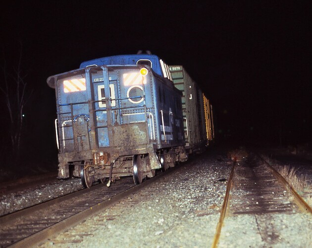 CR. Caboose N5C #23238 east at New Market Rd, Pisc,  NJ. May 1986