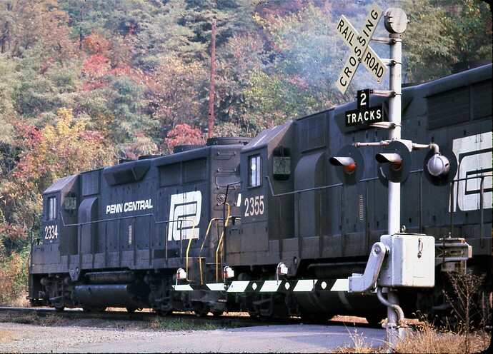PC. GP35 #2334 & #2355 at Rockville Tower,heading north onto P&E.  Oct 1974