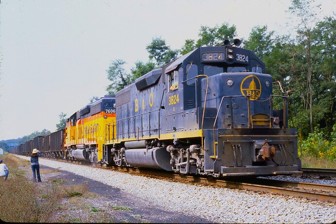 Chessie.GP38 #3824 & SD40-2 #7606 with coal train approaching Caruthers Tunnel. Paw-Paw, WV on Magnolia Curoff Sept 1978