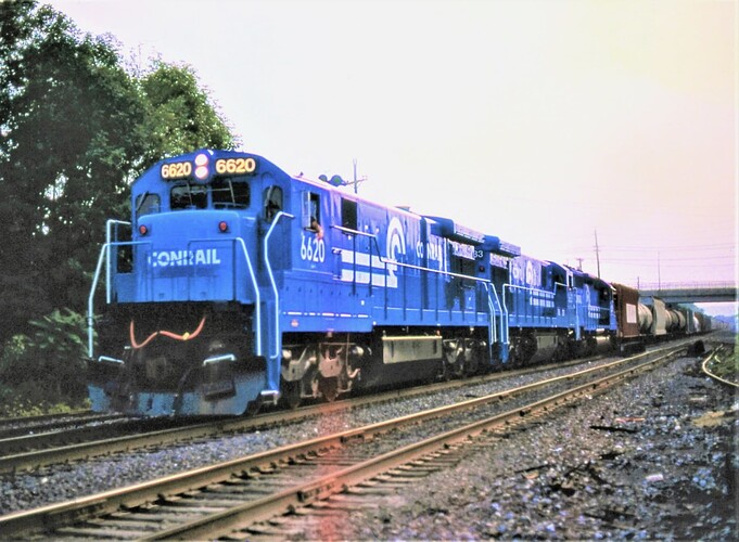 Conrail. GE C36-7 #6620 (blt 6-85), #6633 & 3rd unit at South Plainfield, NJ, Possible train ALOI in July 1985
