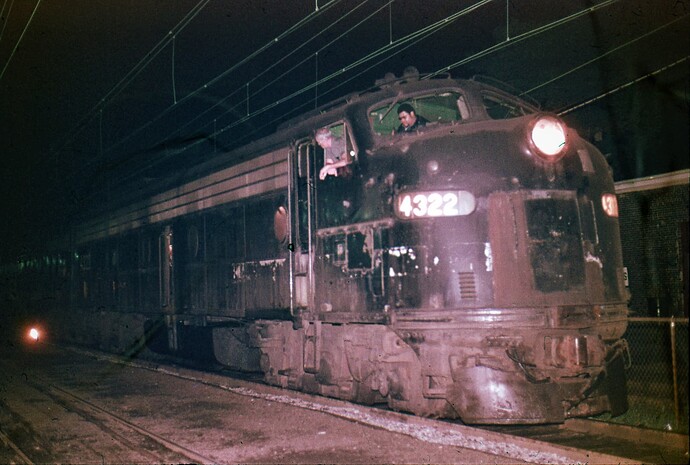 NJT. Ex PC E-8 #4233 west at South Amboy, NJ. Oct 1981