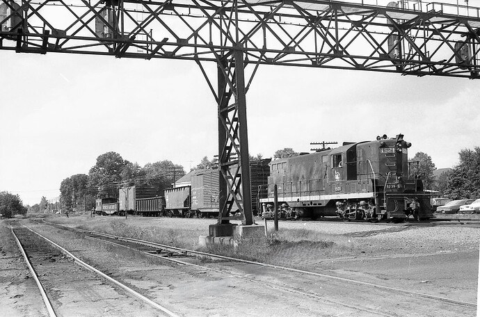 CNJ. FPSD-37 #1521 with High Bridge local at Raritan, NJ August 1972