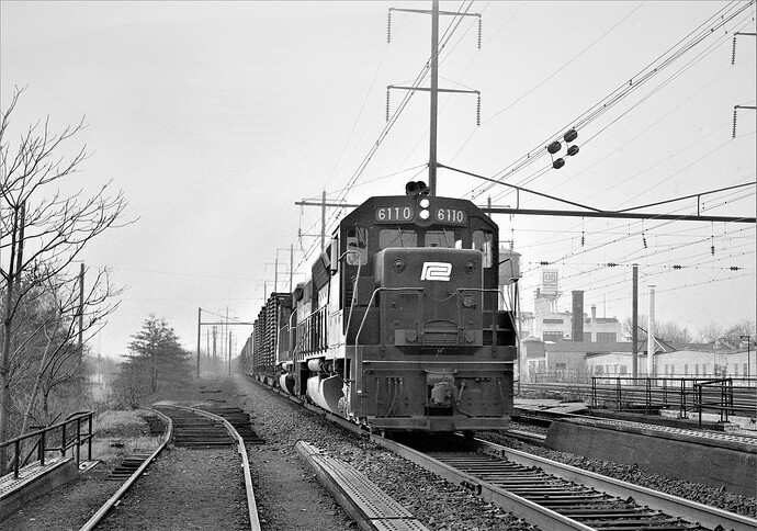 Penn Central. North Rahway, NJ. SD-45 # 6110. East bound freight on track A. Oct. 1973