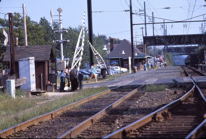 NJT. South Amboy, NJ. Hand operated crossing gates at Augusta St.  Sept 1983