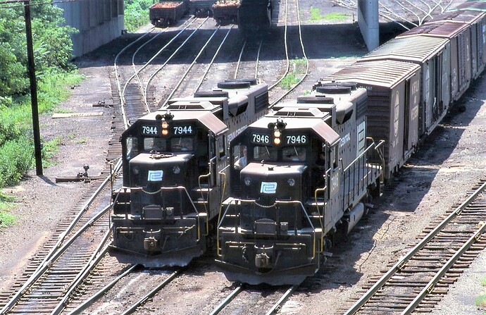 Penn Central GP38-2 #7944 &  #7946 switching the Enola, PA yards. August 1975
