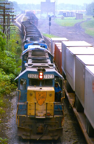 D&H. GP38-2 #7323, GP3-2  & another unit & coal train leaving Conklin Yard. Binghamton, NY. 8-84. Taken from Conklin Road bridge