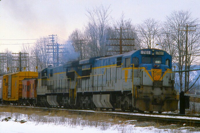 D&H. U33C #756 & #761 push a freight out of Conklin Yard. Binghamton, NY. Feb 1982