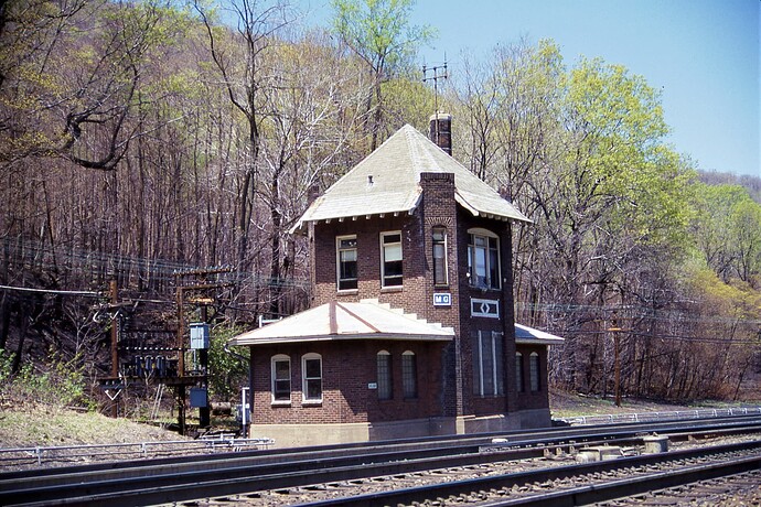 Conrail. MG Tower (Mid Grade) on west slope on Horseshoe Curve, PA. May 5, 1986
