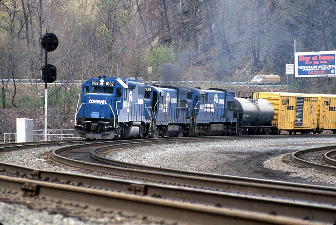 CR. GP38-2 #8102, U23B #2728, U23-C  #6901 approaching Rockville Bridge with EB freight.  4-28-84
