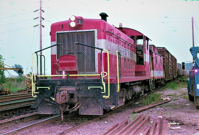 Raritan River RR SW-900 # 3 with freight at interchange track in South Amboy, NJ. 1979