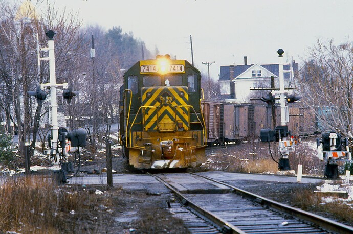 D&H GP39-2 #7414 (ex-Reading), GP38-2 #7616 & U23B #2314.  White Haven, PA. March 1980.
