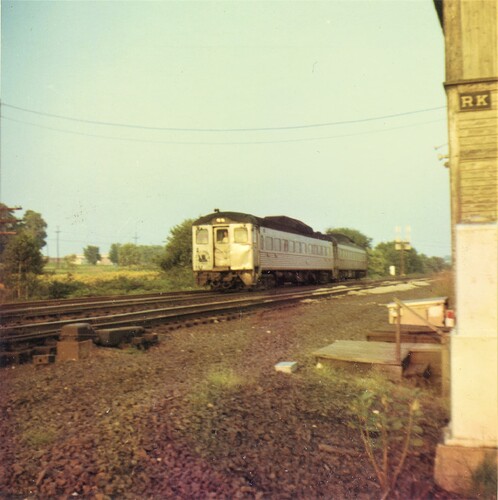 CNJ. RDC trainset westbound at RK Tower, Bound Brook, NJ. Aug 1969