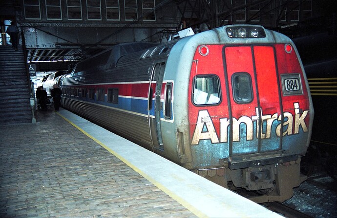 Amtrak. Metroliner #884 at Harrisburg, PA station. Sept 1983