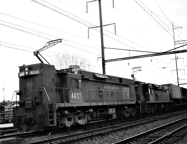 Penn Central E-44 #4437 & #4460 with eastbound freight in New Bruns, NJ. Track 2. Early May 1975
