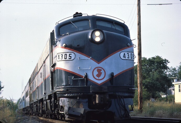 NJT. E-8 #4305 southbound at Cliffwood Beach, NJ. Sept 1982