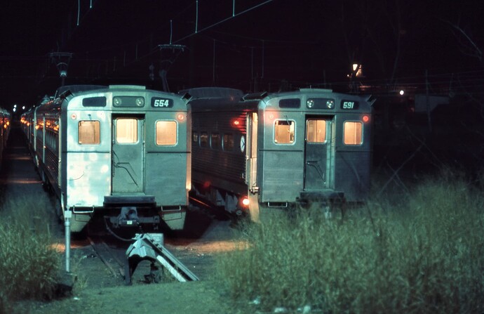 NJT MU trainsets at South Amboy, NJ. Cars #554 and #591 in ready track. Feb 25, 1976. f11, 3 min, ASA160